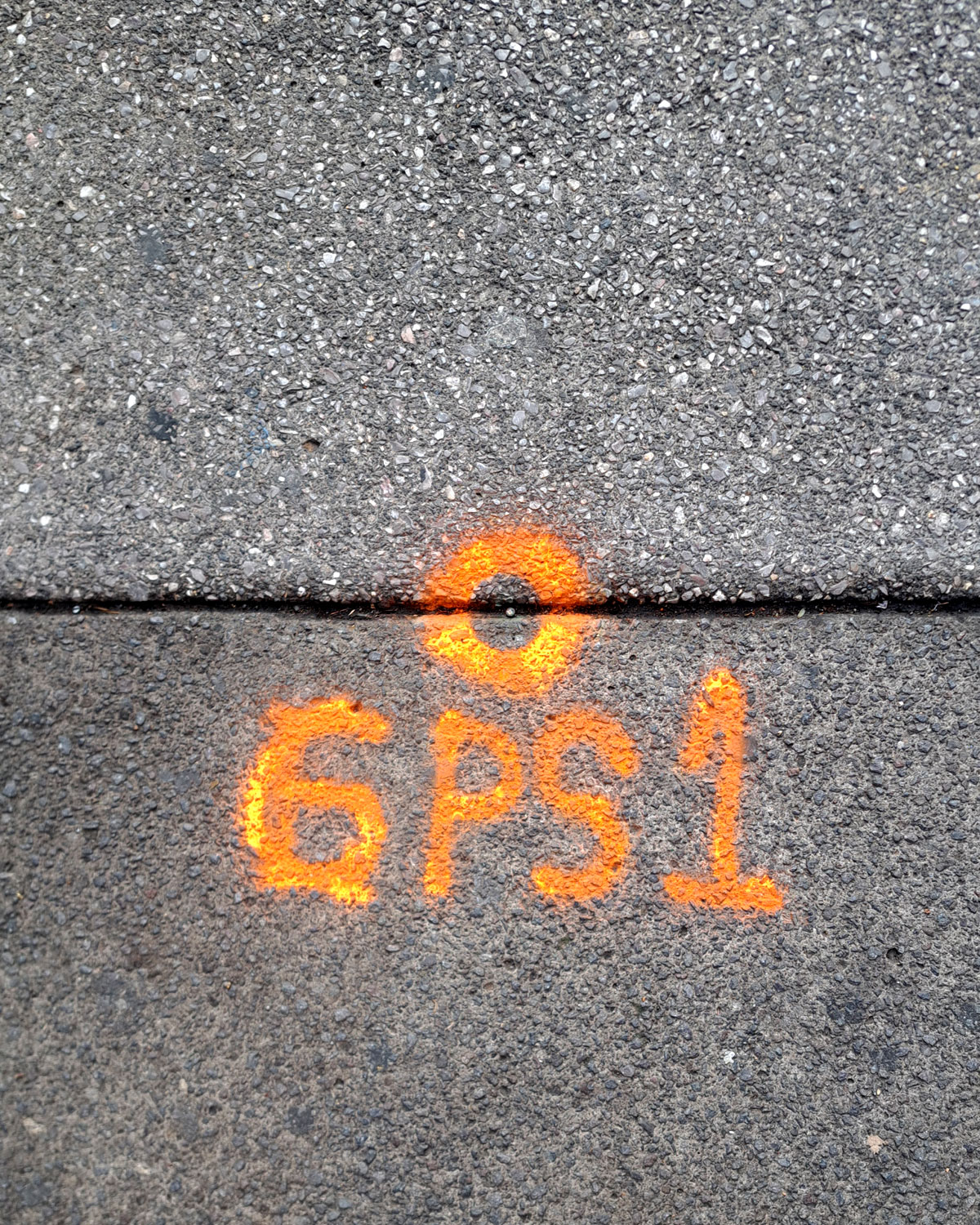 Orange markings on the ground
