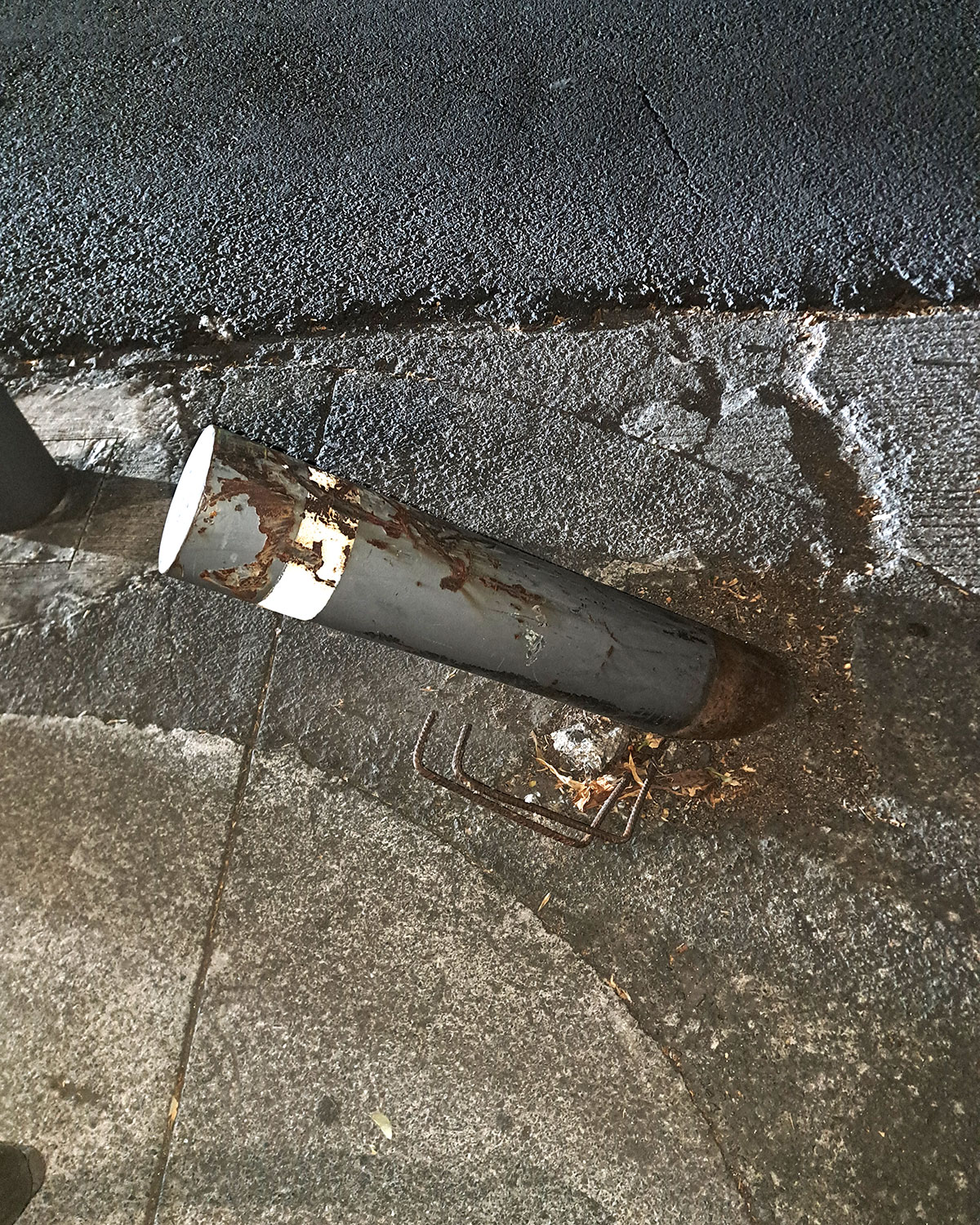 Traffic bollards, crashed